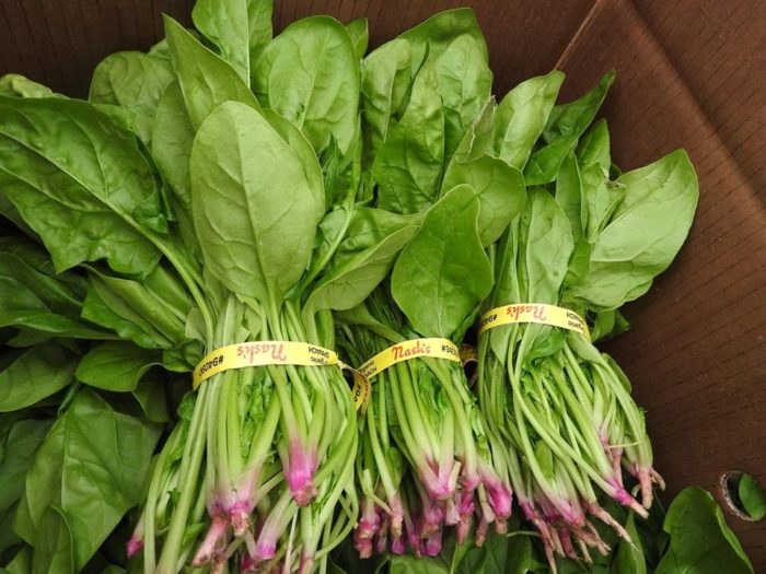 Bunches of spinach in a Nash box